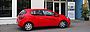 roter Opel Corsa mit teilAuto Logo